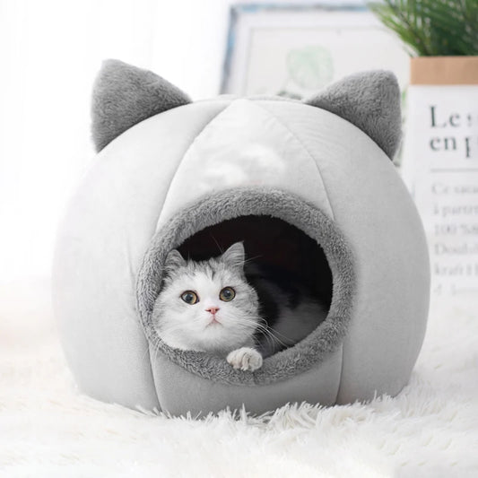 Indulge your feline friend with our cozy cat nest bed, offering unparalleled comfort and warmth.